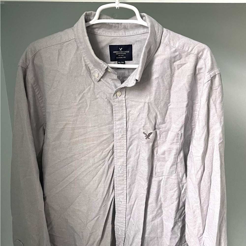 Long sleeved bottom down shirt